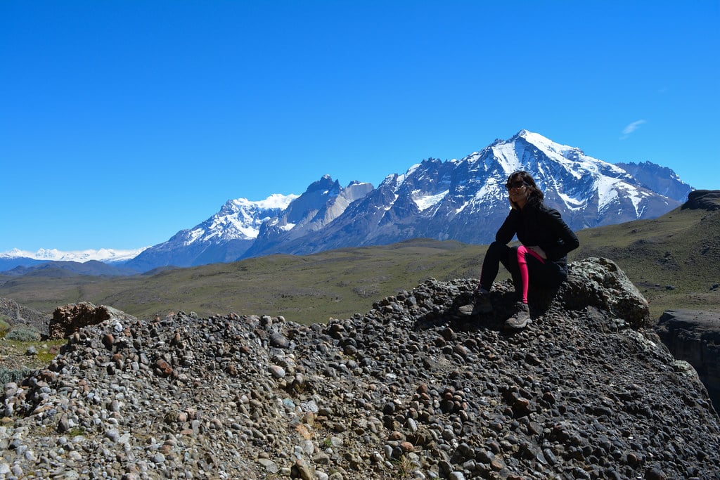 Paz Bascuñan sunbathing in front of the Cordillera del Paine