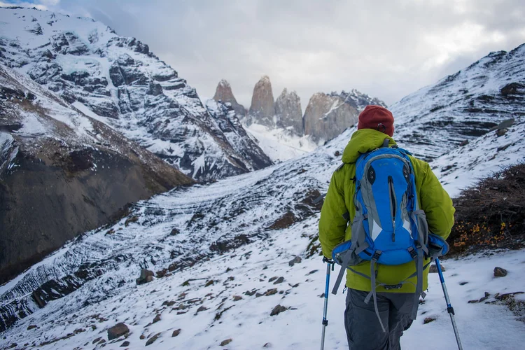 Hiker walking the W Trek in winter in Torres del Paine National Park